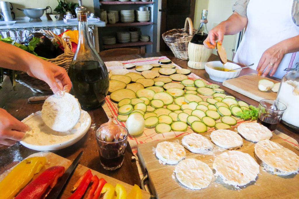 Fried zucchini preparation at Cooking class - Cooking classes in Chianti Siena Tuscany